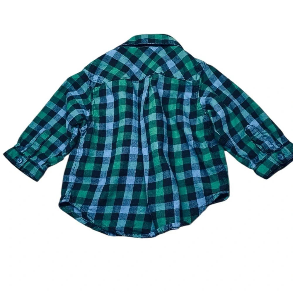 Cozy flannel button-up shirt from The Children’s Place, size 6–9 months.